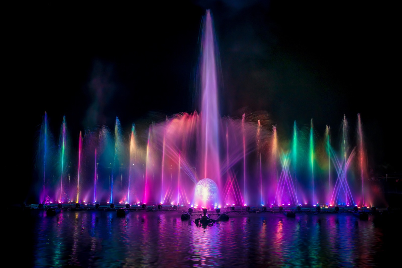 Illuminated custom commercial fountain at night